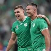 Ireland's Garry Ringrose (left) and Johnny Sexton celebrate victory over Scotland at the Stade de France in Paris