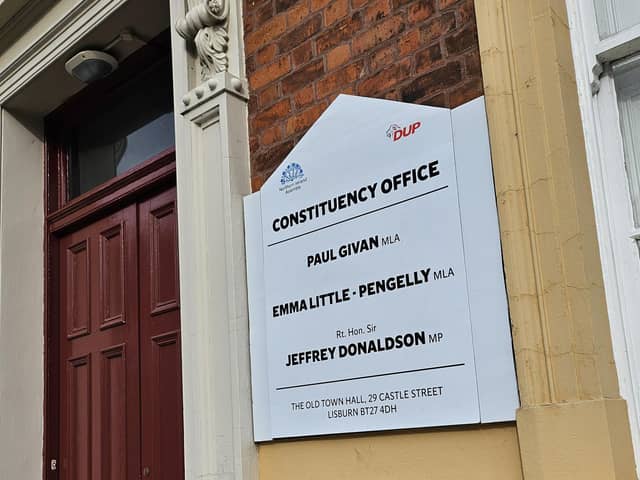 Sir Jeffrey Donaldson is no longer a DUP MP - but his name remains on a temporary sign at the party's Lisburn office.