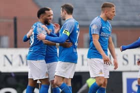 Lido Lotefa celebrates with his teammates after securing a hat-trick. PIC: Alan Weir/Pacemaker Press