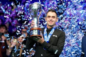 Ronnie O'Sullivan celebrates with the trophy after winning the final against Ding Junhui on day nine of the 2023 MrQ UK Championship at the York Barbican - a record-extending eighth UK Championship. (Photo by Mike Egerton/PA Wire).