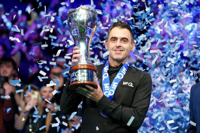 Ronnie O'Sullivan celebrates with the trophy after winning the final against Ding Junhui on day nine of the 2023 MrQ UK Championship at the York Barbican - a record-extending eighth UK Championship. (Photo by Mike Egerton/PA Wire).