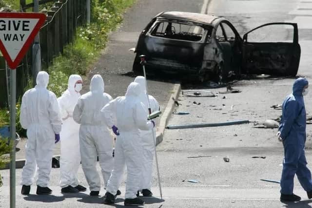 The burnt-out remains of the car after the 2008 attack in Spamount