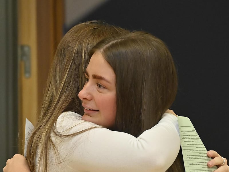 Pupils at Grosvenor Grammar school in Belfast pictured receiving their GCSE exam grades