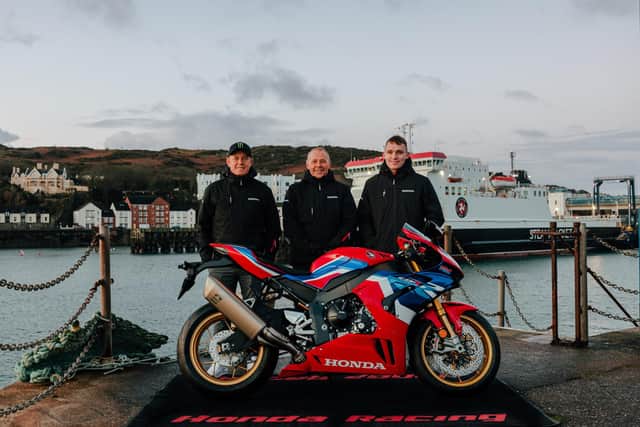 Honda Racing UK's 2023 road racing line-up of John McGuinness and Nathan Harrison with team manager Havier Beltran.
