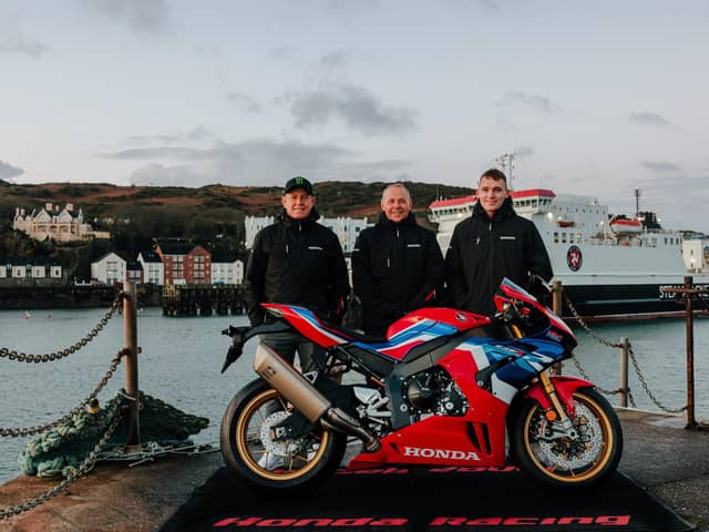 Honda Racing UK's 2023 road racing line-up of John McGuinness and Nathan Harrison with team manager Havier Beltran.