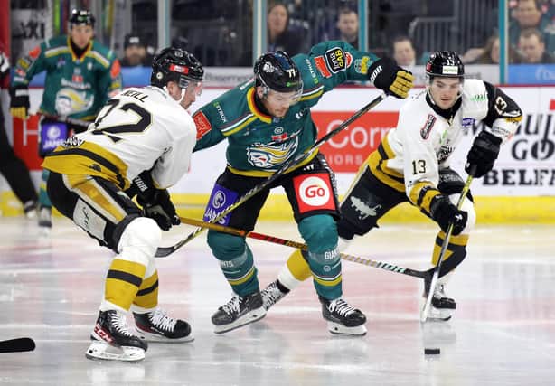 Belfast Giants' Josh Roach (centre) up against Nottingham Panthers’ Carl Neill and Roy Hugo at the SSE Arena. (Photo by William Cherry/PressEye)