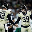 Kai Kroeger #32 and Charlie Smyth #39 of the New Orleans Saints celebrate after Smyth's field goal against the New York Jets in the first quarter of a game at Caesars Superdome on December 21, 2025 in New Orleans, Louisiana. (Photo by Sean Gardner/Getty Images)
