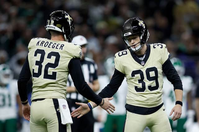 Kai Kroeger #32 and Charlie Smyth #39 of the New Orleans Saints celebrate after Smyth's field goal against the New York Jets in the first quarter of a game at Caesars Superdome on December 21, 2025 in New Orleans, Louisiana. (Photo by Sean Gardner/Getty Images)