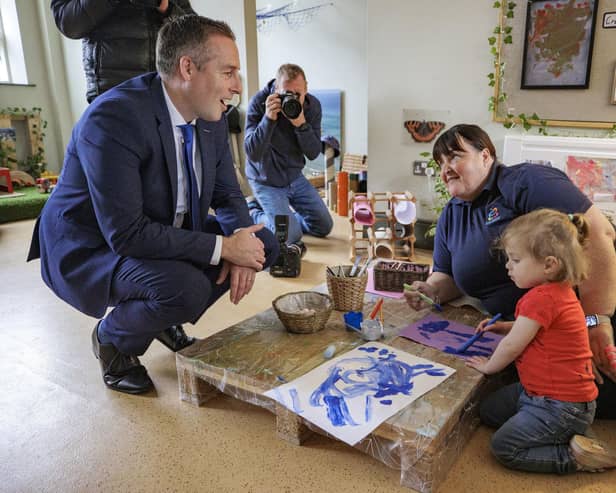 Education Minister Paul Givan during a visit to a Sure Start centre in east Belfast, where he announced a new childcare subsidy scheme is to be offered to working parents in Northern Ireland as part of a £25 million package of measures