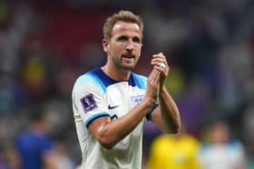 England's Harry Kane applauds the fans after the World Cup Group B match against USA on Friday at the Al Bayt Stadium in Al Khor, Qatar.