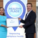 Hughes Insurance has become the first and only company in Northern Ireland to achieve the Healthy Place to Work certification for the third time. It highlights the organisation as a leading firm for workplace health, culture, and well-being. Pictured are Bernie McHugh Sonner, director of operations and customer services at Hughes Insurance and John Ryan, founder and CEO of Healthy Place to Work