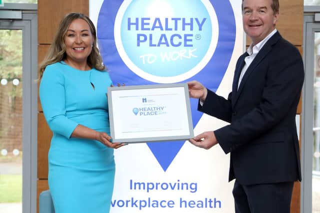 Hughes Insurance has become the first and only company in Northern Ireland to achieve the Healthy Place to Work certification for the third time. It highlights the organisation as a leading firm for workplace health, culture, and well-being. Pictured are Bernie McHugh Sonner, acting CEO at Hughes Insurance and John Ryan, founder and CEO of Healthy Place to Work