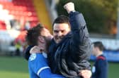 Mark Stafford and David Healy celebrate after an Irish Cup victory in 2026. (Photo by Brian Little/Presseye)