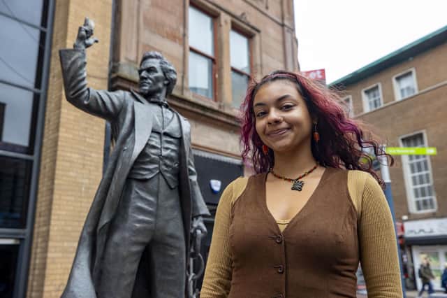 Frederick Douglass Global Fellow, Zoirana Martinez, stands next to the newly unveiled statue of anti-slavery campaigner Frederick Douglass in Belfast. Rev Ivan Foster fears that much of the interest in Douglass will overlook the most important fact about him, his conversion to Christianity. Photo: Liam McBurney/PA Wire