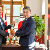 Northern Ireland Minister of State Steve Baker celebrates the historic deal with Kwan-tae Kim, executive marketing director, Golden Blue. The agreement will see almost 10,000 bottles of McConnell’s Irish Whisky shipped to South Korea