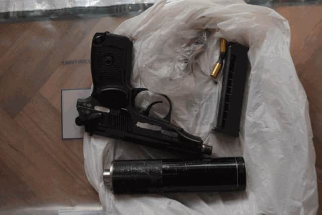 A Gun and silencer  As part of a search conducted by police, a significant cache of explosives, weapons and ammunition was uncovered at a family home in Ballymurphy, west Belfast, in 2015.
Fionnghuala Mary Teresa Dympna Perry was sentenced today, Wednesday 17 May, at Belfast Crown Court.

The 65-year-old was sentenced to serve four years in custody, having previously been found guilty of terrorism-related offences.