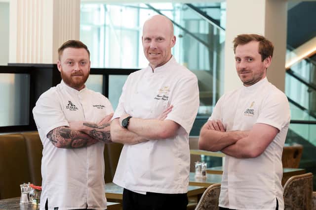 Damian Tumilty (centre) is pictured with Head Chefs, Stevie Bracken of the Europa Hotel and Tom Mulcahy of the Grand Central, at the announcement that he has been appointed executive head chef of the world-famous Europa Hotel, in addition to his role as executive head chef at the 5-star Grand Central Hotel. In his new role, Tumilty, who has over 25 years culinary experience, will lead the teams of more than 50 kitchen staff