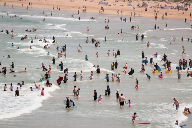 Members of the public enjoying the weather in Portrush this afternoon. Photo by Jonathan Porter // Press Eye