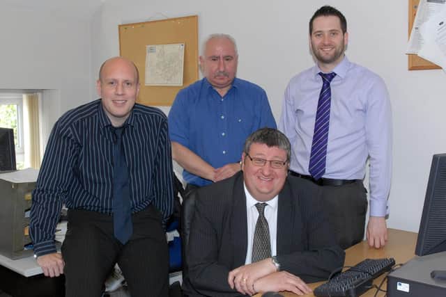 John Bingham in the Lurgan Mail office with editor Clint Aiken (seated) and reporters Graeme Cousins and Ruairi Creaney