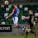 Matthew Fitzpatrick heads in his first Linfield goal during the Blues' home win against Crusaders on Tuesday night