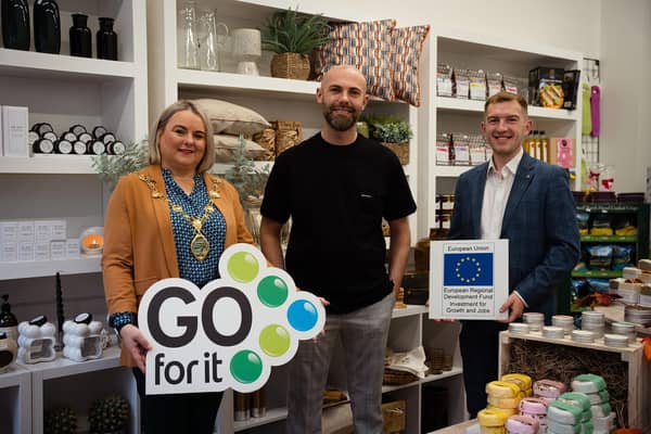 A former retail manager, Conor Irvine spotted a gap in the market and has opened his own homeware and deli business thanks to the help of the Go For It programme in association with Derry City and Strabane District Council.  Pictured is cllr Sandra Duffy, Mayor of Derry City and Strabane District Council, Conor Irvine from Vine Living and Caolan Campbell from Enterprise North West