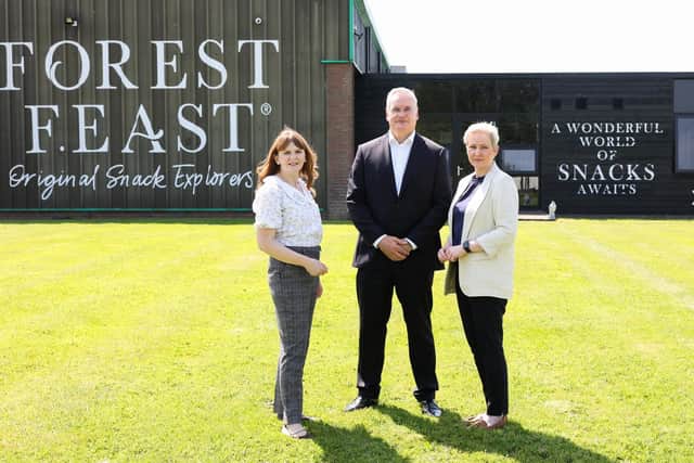 Northern Ireland plant-based snack manufacturer Kestrel Foods has announced a £5m investment to support growing international demand for its chocolate snack ranges. Pictued is Economy Minister Dr Caoimhe Archibald with Michael Hall, Kestrel Foods founder and managing director, and Grainné Moody, director of Food and Drink, Invest NI