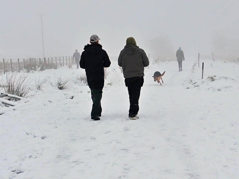 Walkers on Divis Mountain  on the outskirts of Belfast on Wednesday