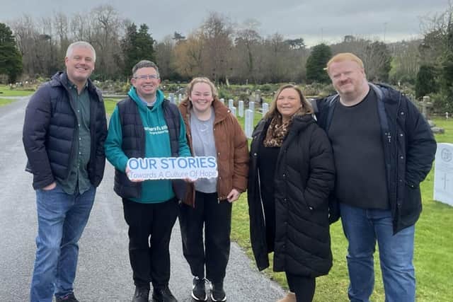 A photo opportunity during the Friendship Day organised by Fr Martin Magill in Belfast City Cemetery on 10 February. From left, Councillor Michael Long, Fr Martin Magill, Jasmine Stockman, Councillor Nicola Verner and Councillor Brian Smith. Photo: Robbie Butler