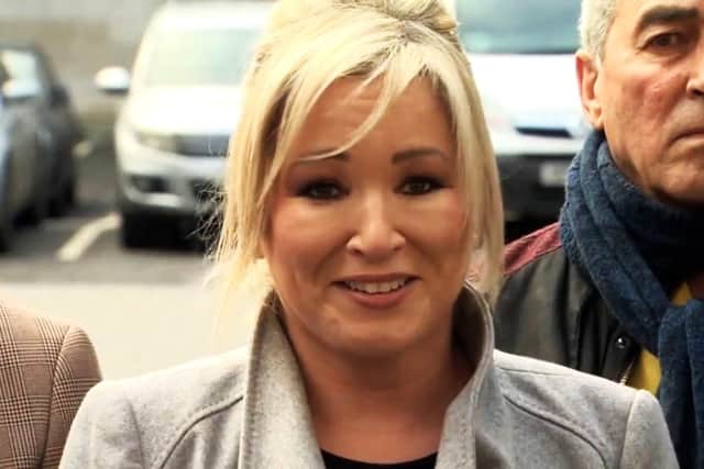 Michelle O'Neill answering questions from the press about its libel actions