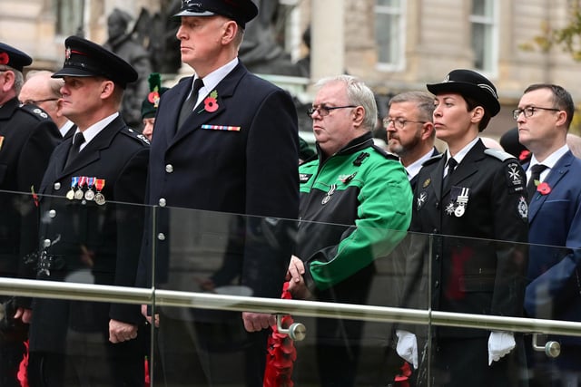 Up to 2,000 people gathered at Belfast City Hall on Sunday as the city joined the rest of the UK in marking Remembrance Day.
The main ceremony in the city took place at the Garden of Remembrance close to the Cenotaph. People joined in the nationwide two-minute silence which was held at 11am.  Representatives from all the main churches were also in attendance, with prayers offered up by the Presbyterian Church Moderator Dr John Kirkpatrick.
Picture By: Arthur Allison/Pacemaker Press.