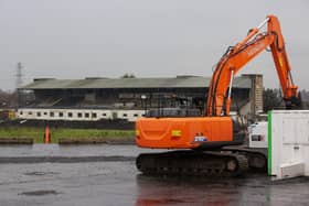 Contractors with excavators have begun clearing the concrete seating terraces at Casement Park GAA stadium in Belfast . Photo: Liam McBurney/PA Wire