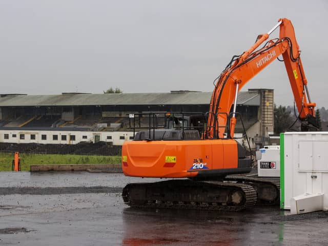 Contractors with excavators have begun clearing the concrete seating terraces at Casement Park GAA stadium in Belfast . Photo: Liam McBurney/PA Wire