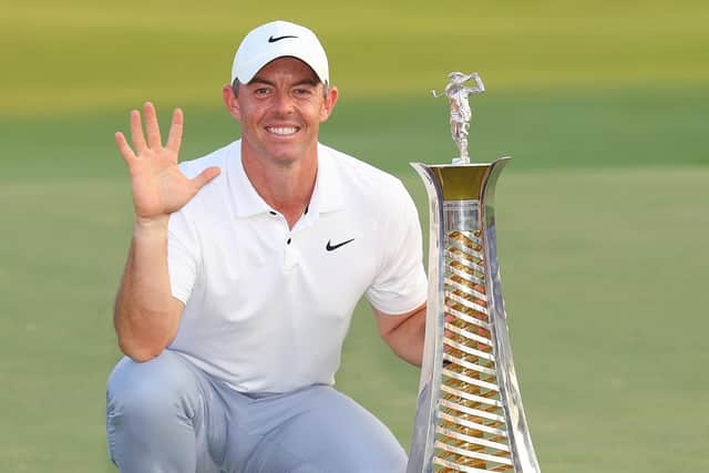 Rory McIlroy of Northern Ireland poses with the Race to Dubai trophy on the 18th green during Day Four of the DP World Tour Championship on the Earth Course at Jumeirah Golf Estates on November 19, 2023 in Dubai, United Arab Emirates. (Photo by Andrew Redington/Getty Images)