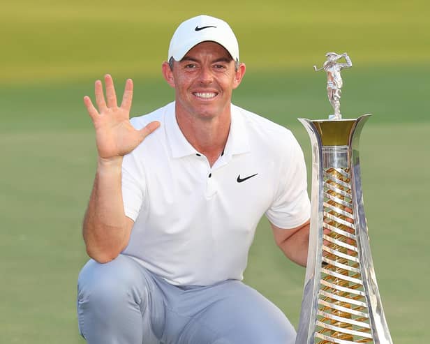 Rory McIlroy of Northern Ireland poses with the Race to Dubai trophy on the 18th green during Day Four of the DP World Tour Championship on the Earth Course at Jumeirah Golf Estates on November 19, 2023 in Dubai, United Arab Emirates. (Photo by Andrew Redington/Getty Images)
