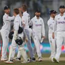 Ben Stokes of England walks his team off, after day three during the First Test Match between Pakistan and England at Rawalpindi Cricket Stadium on Sunday. (Photo by Matthew Lewis/Getty Images)