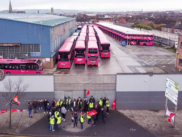 Transport workers taking part in a 24 hour strike in east Belfast on 1 December.  Ulsterbus, Metro, Glider and Goldliner buses and coaches were locked in depots across Northern Ireland while workers picketed outside. 
Picture by Jonathan Porter/PressEye