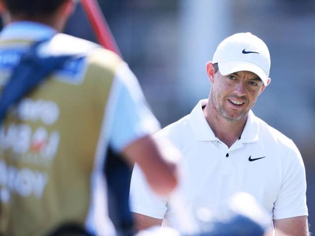 Rory McIlroy looks on from the ninth green during Round One of the Hero Dubai Desert Classic at Emirates Golf Club
