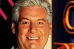 Roy Walker presenting the hit TV show Catchphrase during the 1980s