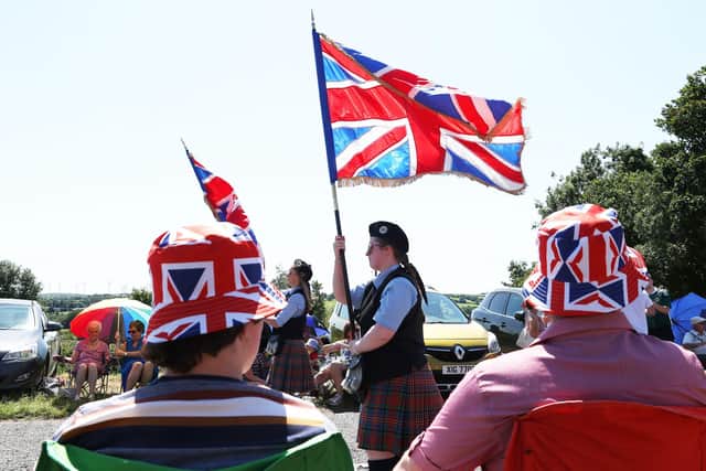 Flying the flag at the Twelfth Demonstration in Sixmilecross, Co Tyrone, 2025