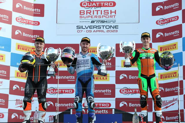 Lee Johnston celebrates his victory in the British Supersport Sprint race at Silverstone on Saturday with runner-up Luke Stapleford (right) and Tom Booth-Amos. Picture: David Yeomans Photography