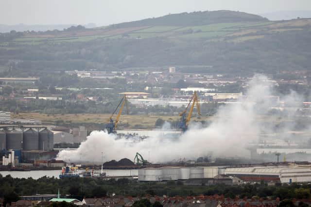 More than 50 firefighters worked through the night to bring a blaze at a scrap metal recycling facility under control.The fire at Clearway Disposals in Belfast's dock area was reported shortly after midday on Wednesday. Photo by Jonathan Porter // Press Eye