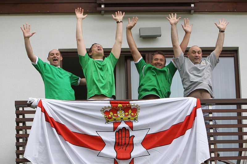 Northern Ireland fans from Lisburn on their hotel balcony before the game