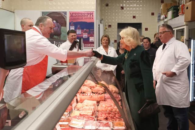 Queen Camilla meets staff at Coffey's Butchers during a visit to Lisburn Road in Belfast to meet shop owners and staff, on Thursday 21 March, 2024. Photo: Liam McBurney/PA Wire