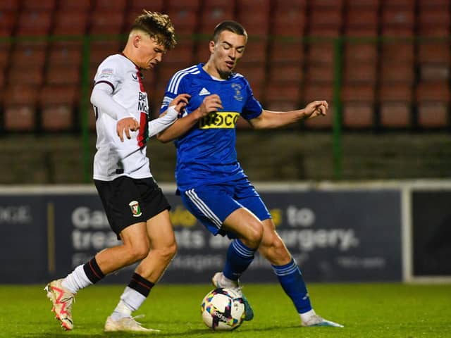 George Feeney in action for Glentoran last season. PIC: Andrew McCarroll/ Pacemaker Press