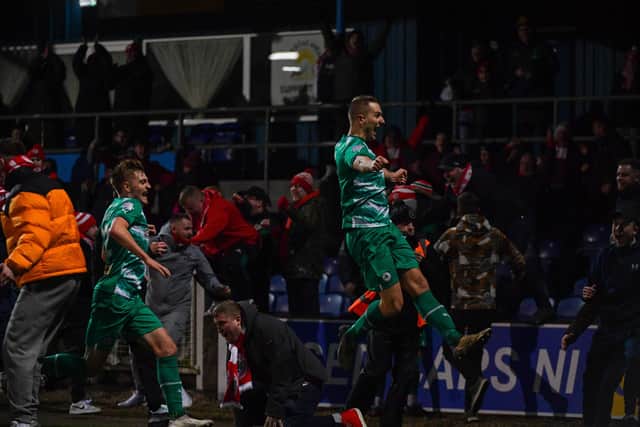 Jonny Addis scores a dramatic late winner for Cliftonville against Newry City. PIC: Andrew McCarroll/ Pacemaker Press