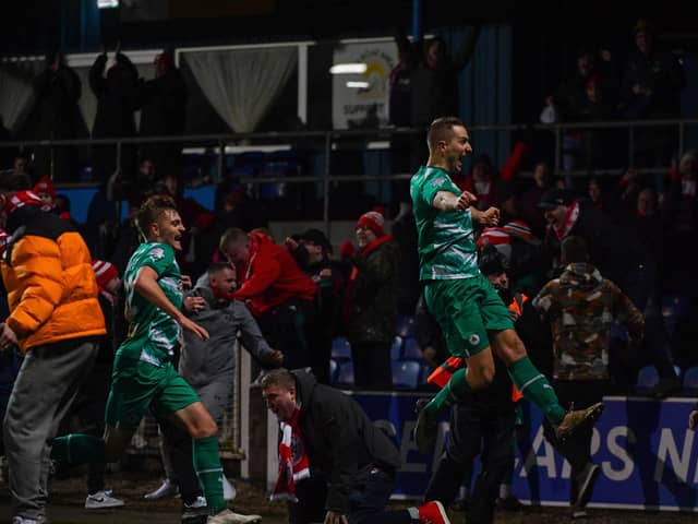 Jonny Addis scores a dramatic late winner for Cliftonville against Newry City. PIC: Andrew McCarroll/ Pacemaker Press