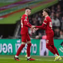 Liverpool's Conor Bradley (left) is replaced by substitute Bobby Clark during the Carabao Cup final at Wembley Stadium. (Photo by Adam Davy/PA Wire)