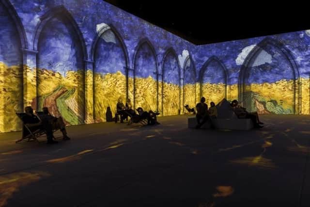 Sit among whatfields of buttery yellow that reach up to indigo skies as part of the immersive experience