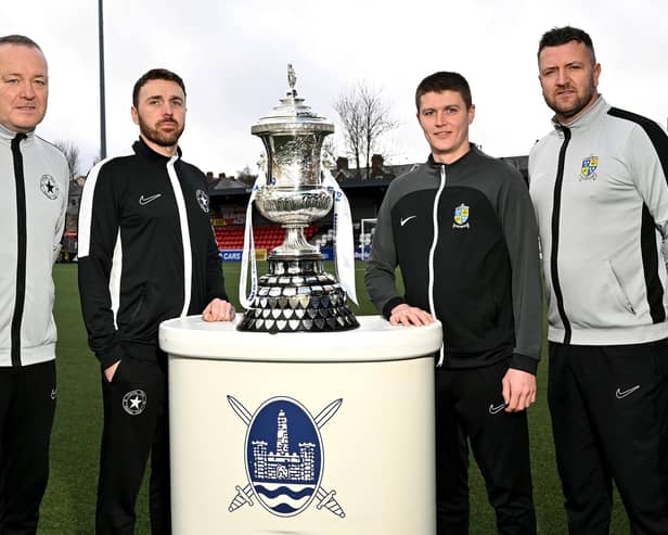 Crumlin Star manager Paul Trainor and captain Niall Hawkins pictured with Comber Rec manager Gareth McKeown and captain Simon Hanna. PIC: Stephen Hamilton