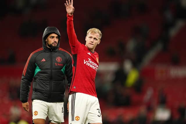 Donny van de Beek gestures to the Manchester United fans. (Photo by Martin Rickett/PA Wire)